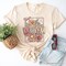 Floral Mama Coquette Bow Pastel T-Shirt, White and Natural Boho Tee With Spring Flower